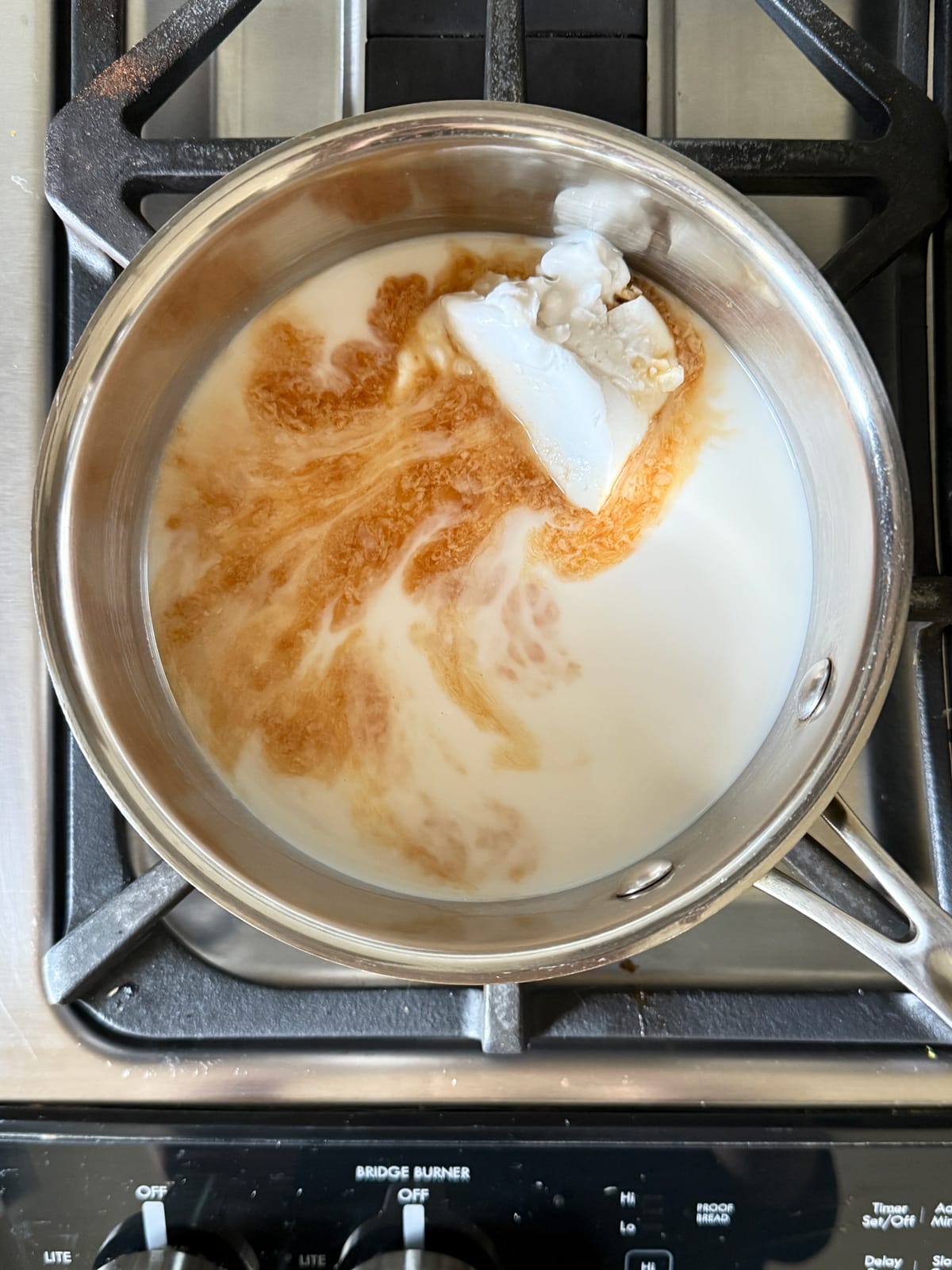 Warming the hot chocolate on the stovetop.