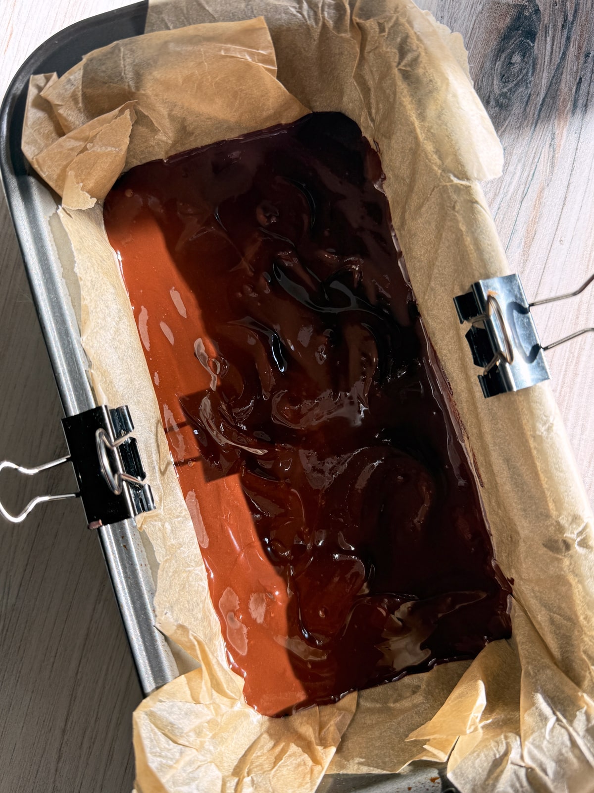 Chocolate topping on bars, ready to chill.