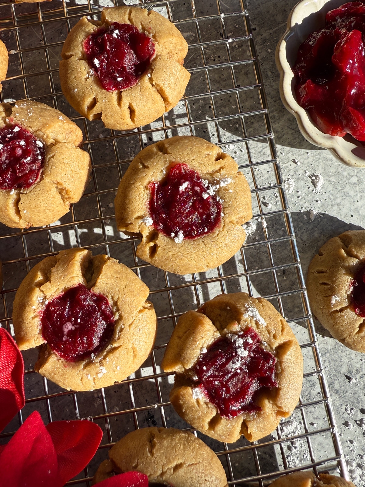 Top view of cranberry thumbprint cookies.