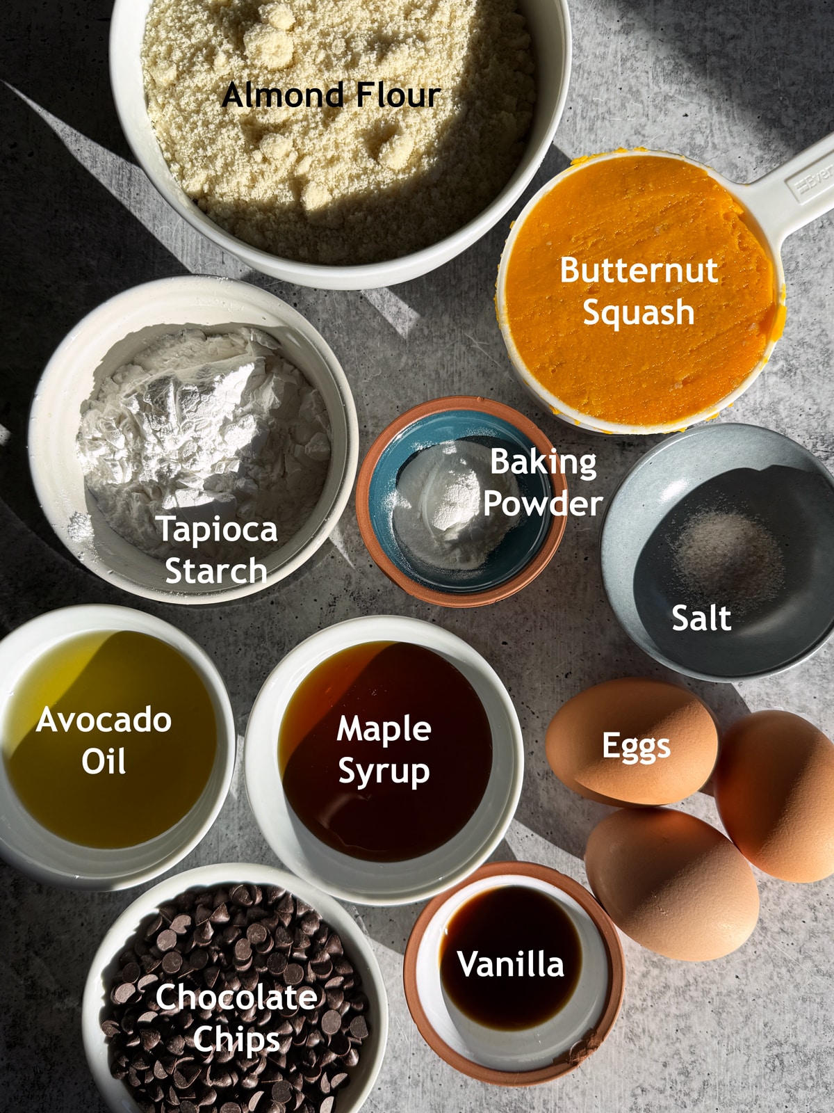 Ingredients needed to make gluten free butternut squash bread with chocolate chips.