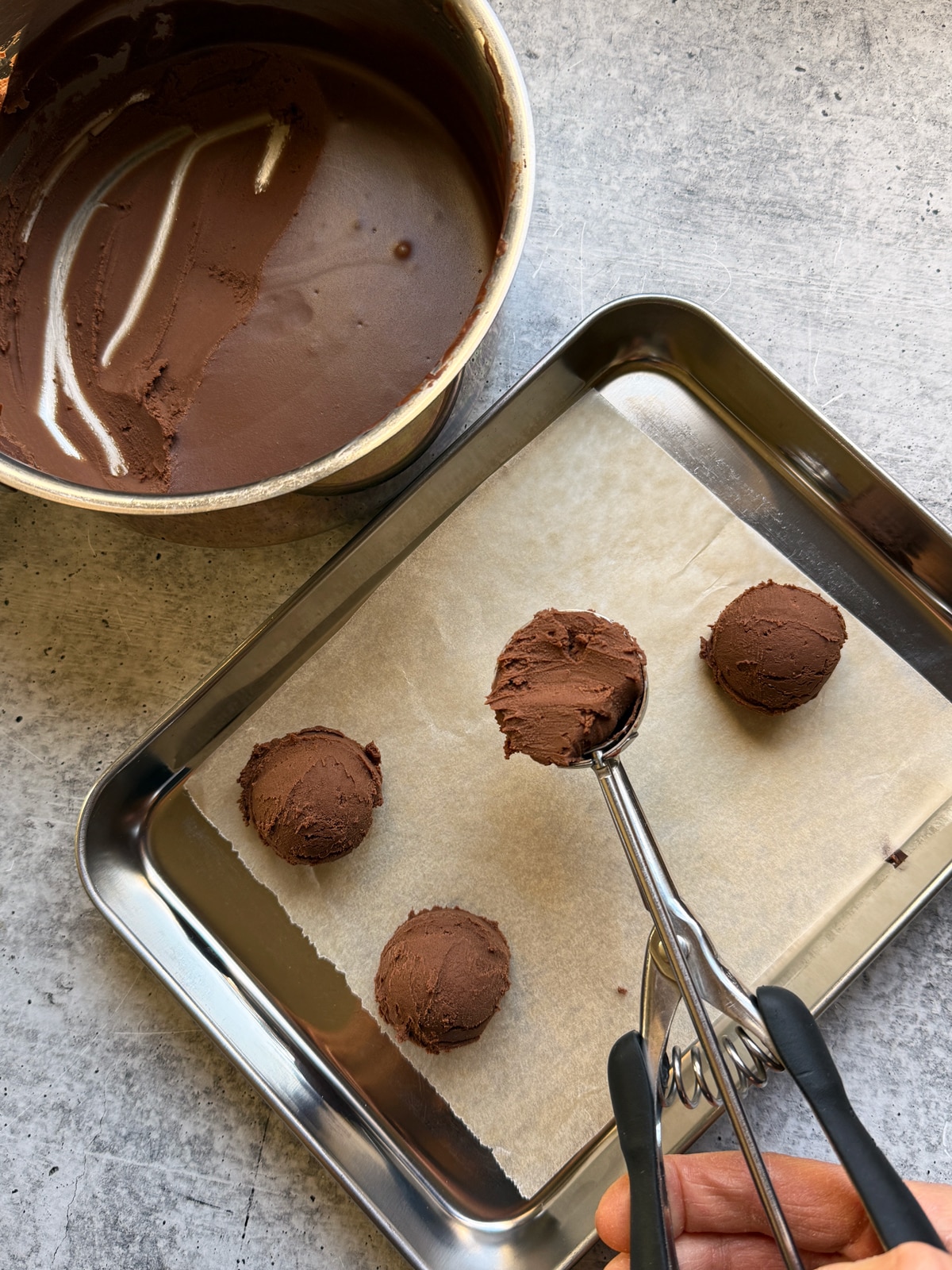 Scooping the filling to freeze.