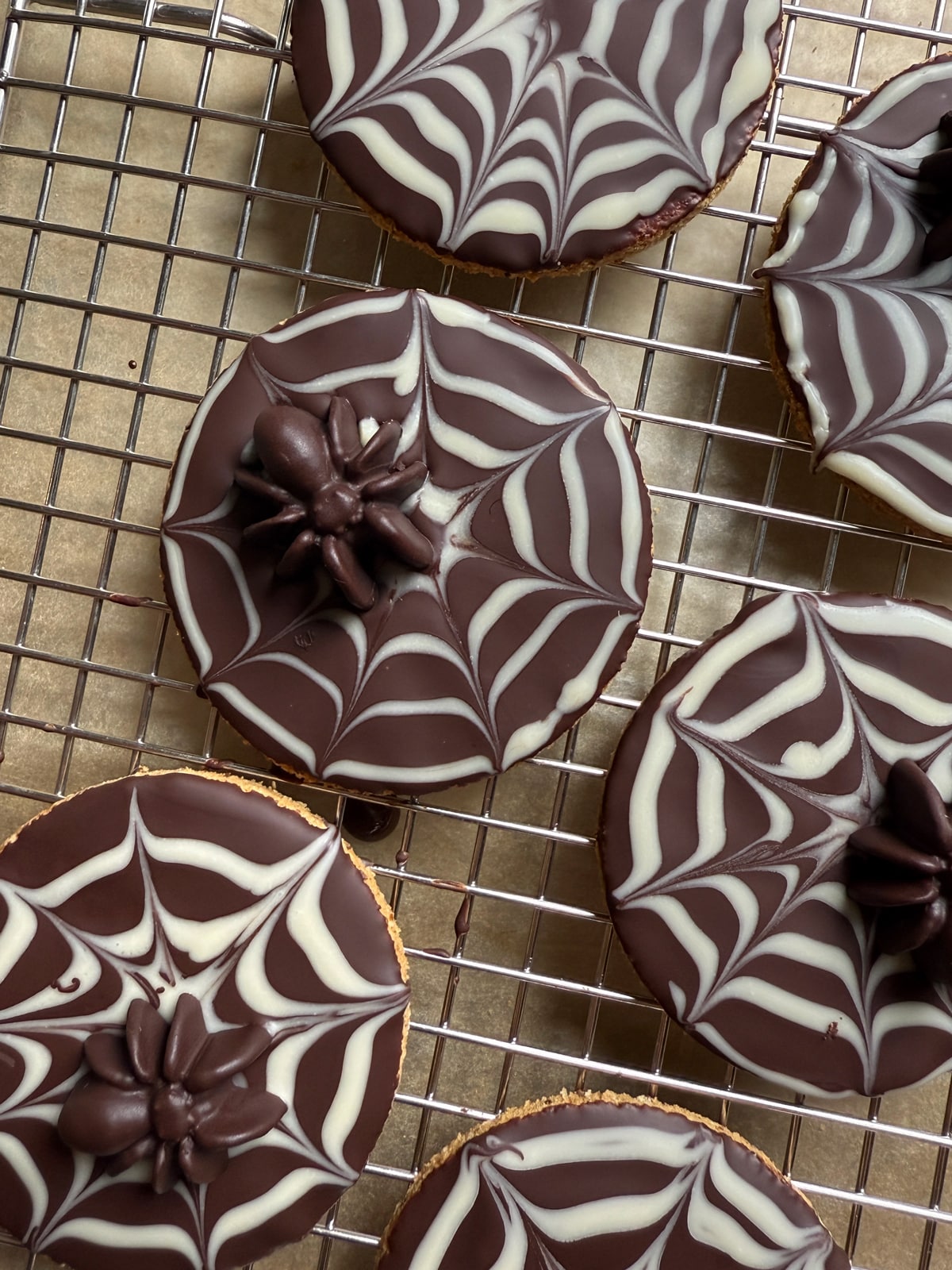 Coconut flour sugar cookies decorated with a Halloween theme.