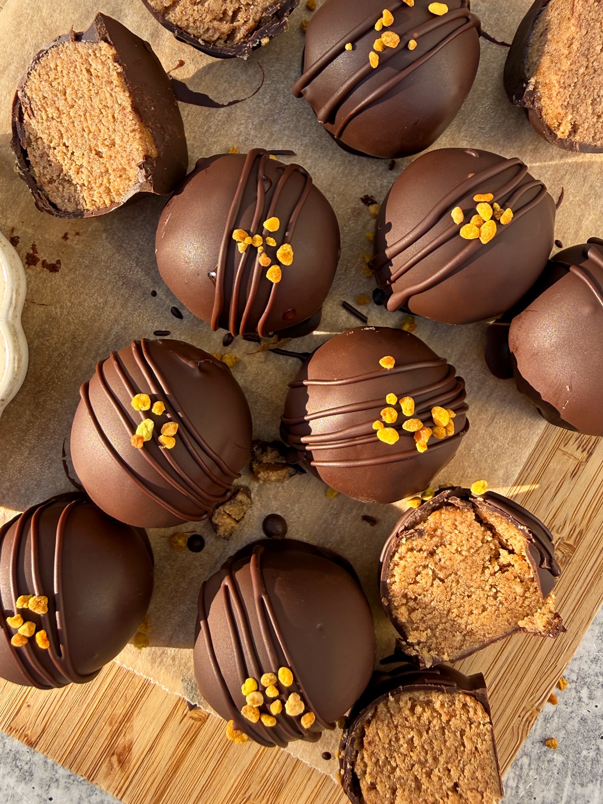 Top down view of collagen balls on cutting board.