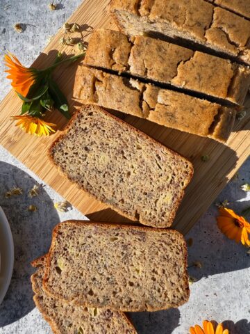 Slices of bread on cutting board.