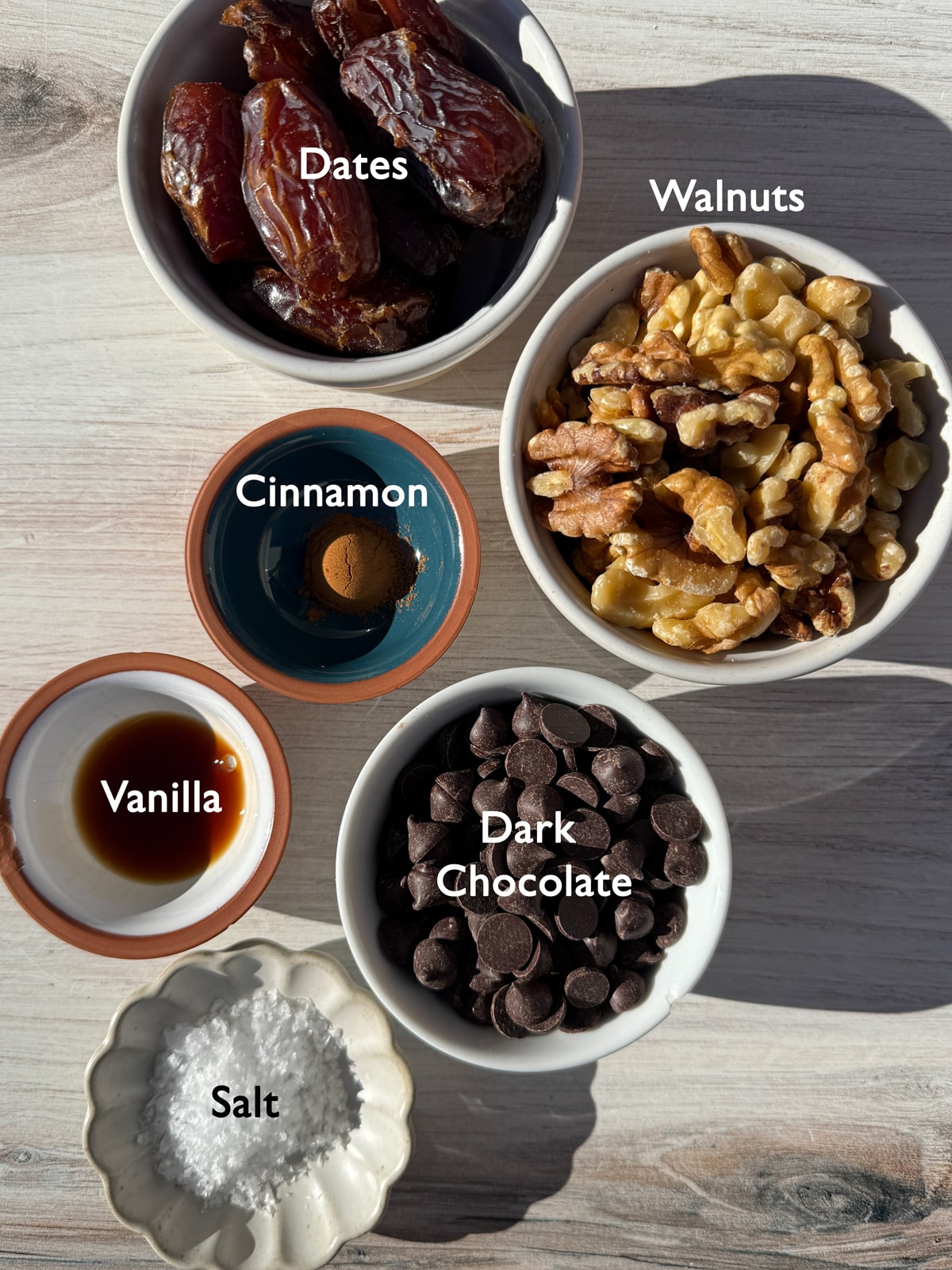 Ingredients needed to make chocolate walnut date balls.