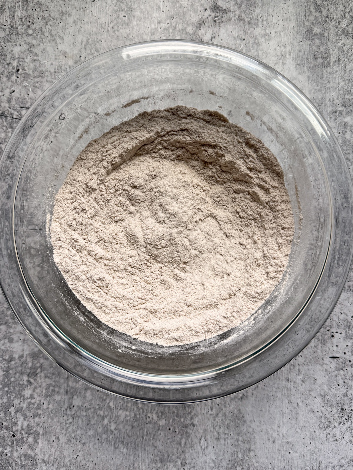 Combined dry muffin ingredients in mixing bowl.