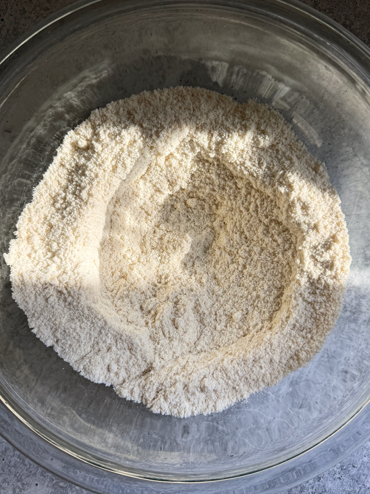 Combined dry scone ingredients in mixing bowl.