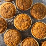 Top down view of baked carrot buckwheat muffins.