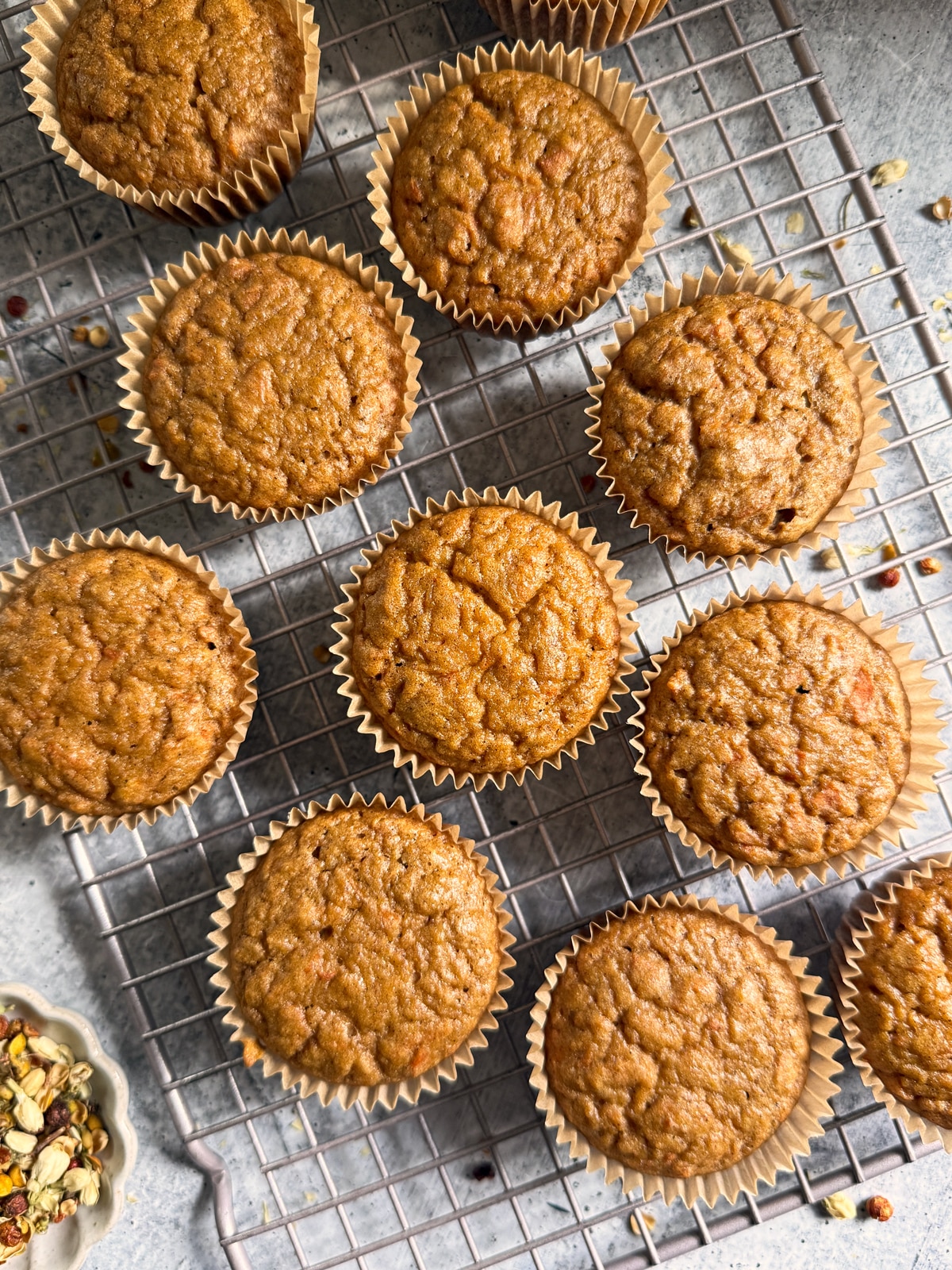 Muffins on wire cooling rack.