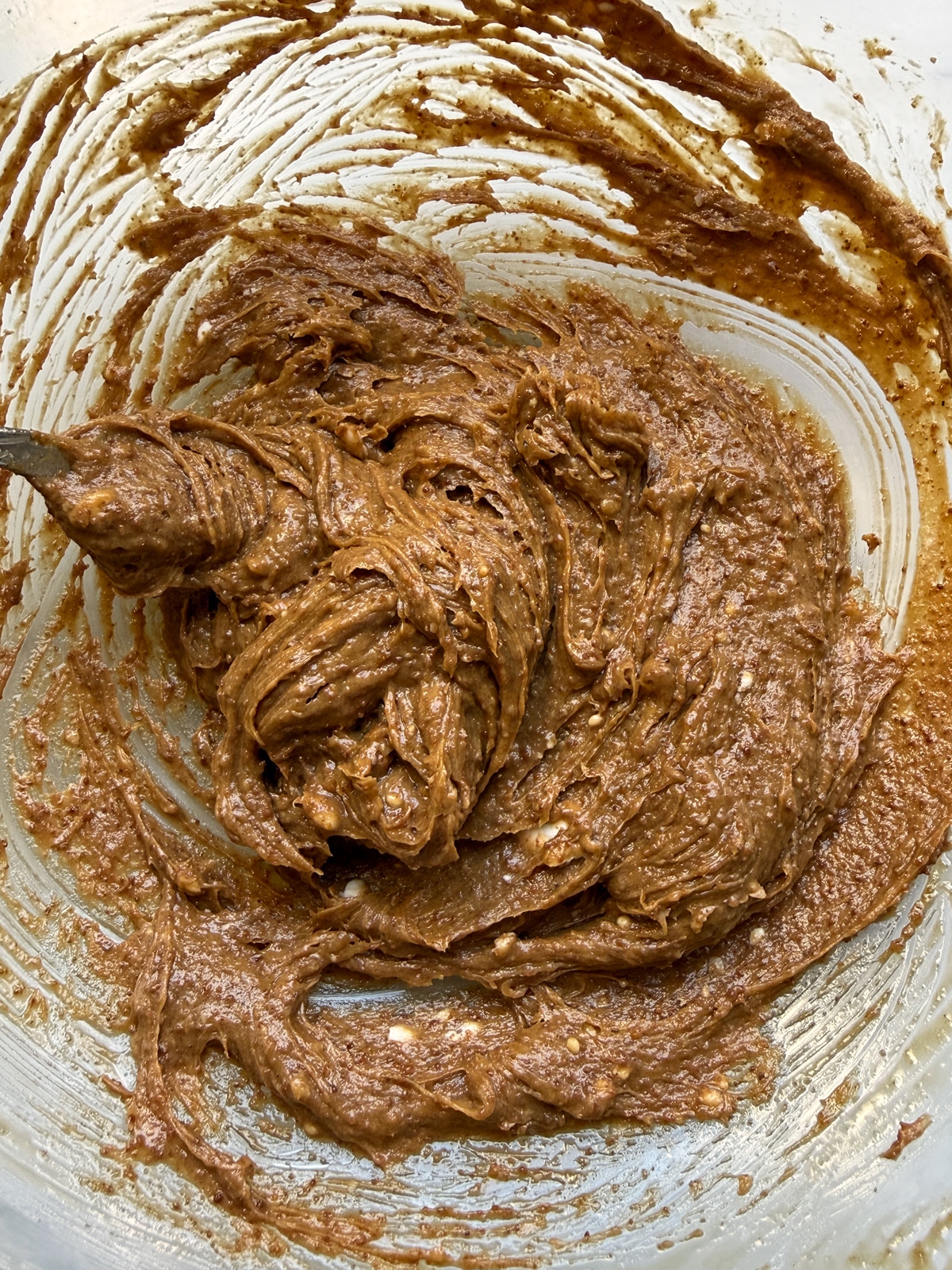 Combined wet cookie ingredients in mixing bowl.