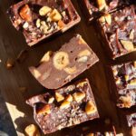 Dark chocolate hazelnut fudge on cutting board.