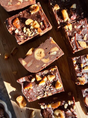 Dark chocolate hazelnut fudge on cutting board.