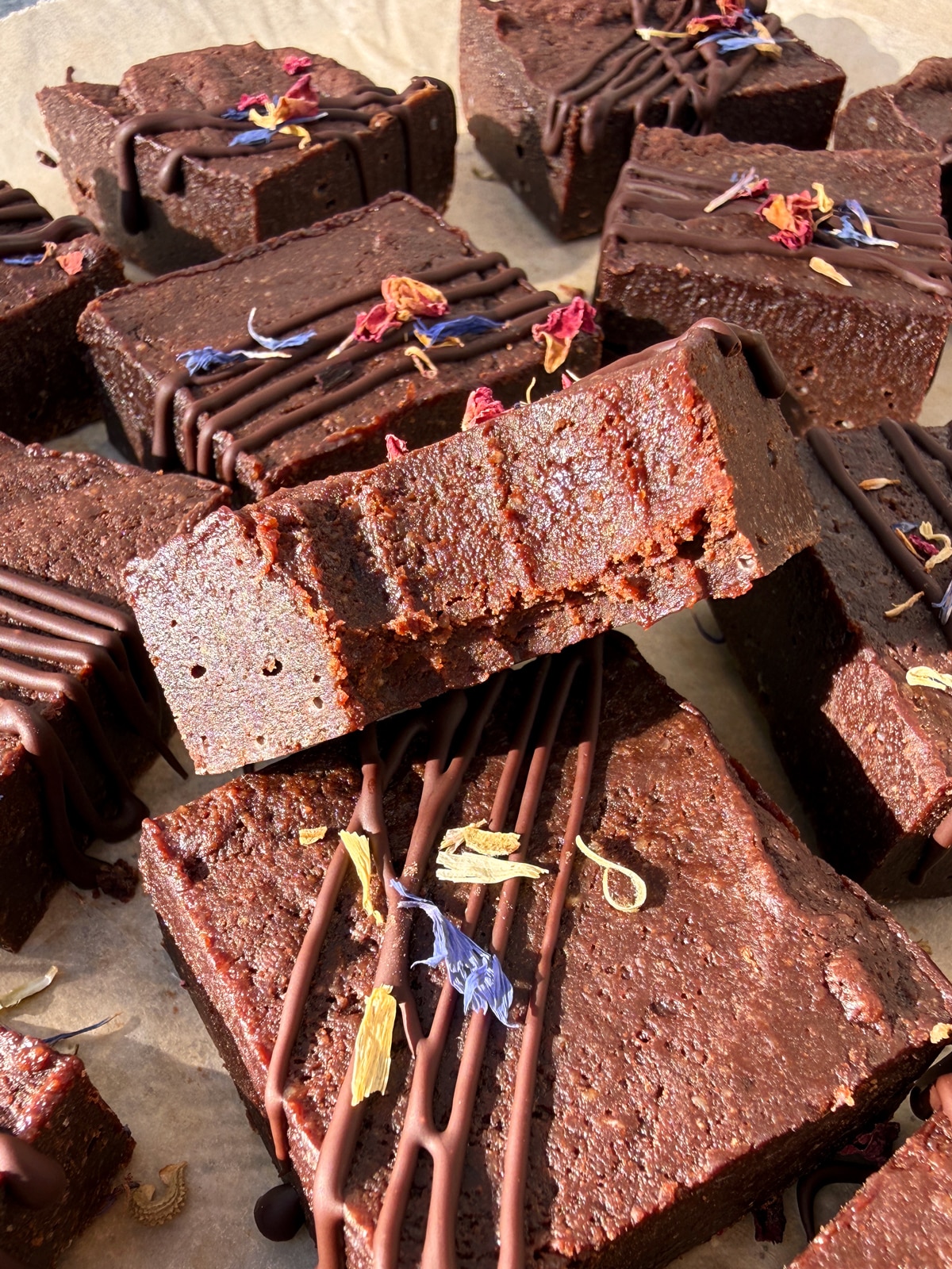 Close up of brownie with a bite out of it to show the texture.
