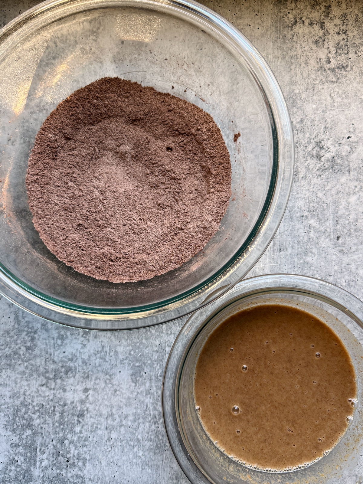 Combined dry ingredients in one bowl and combined wet ingredients in another.