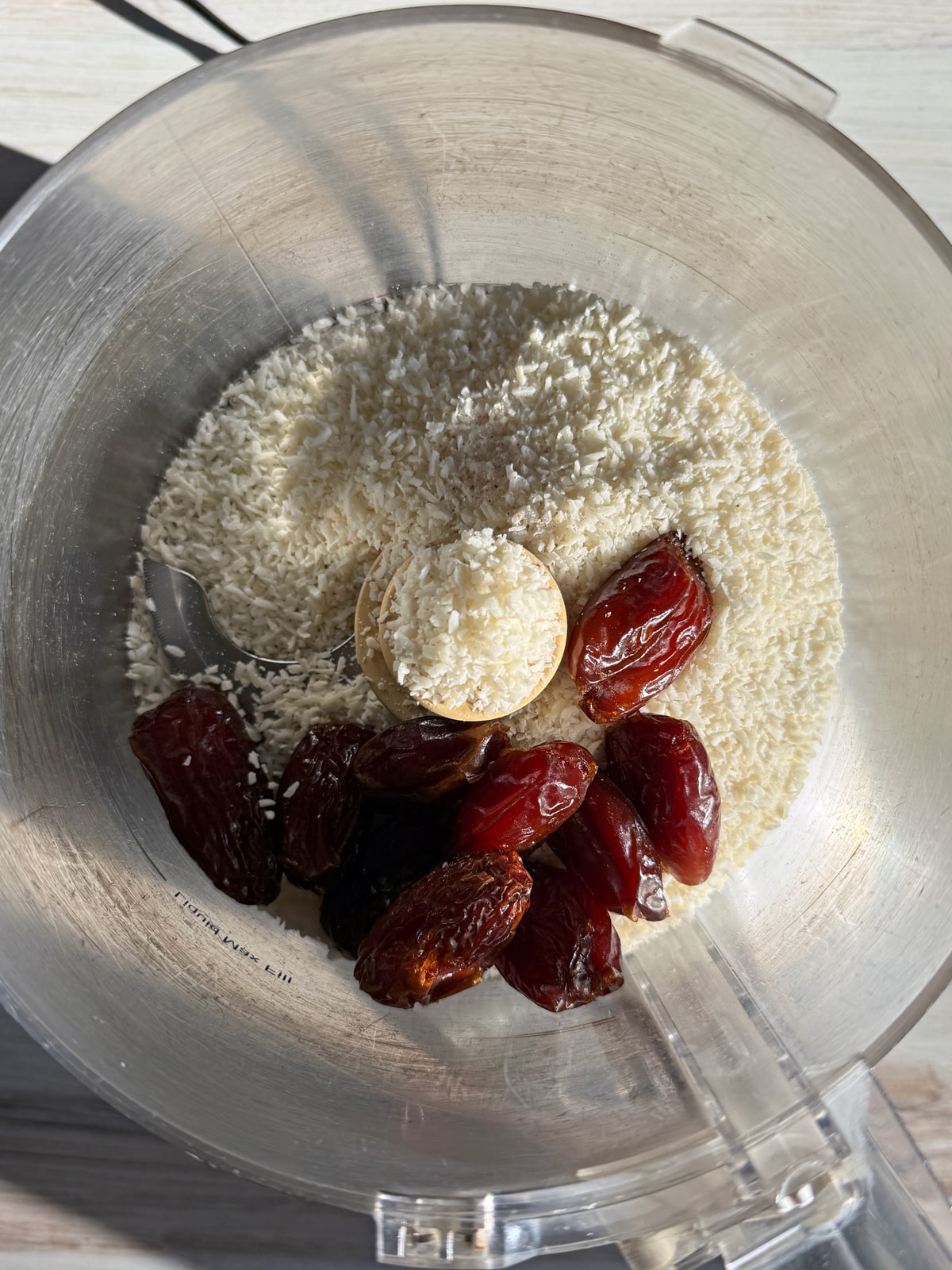 Filling ingredients in food processor.