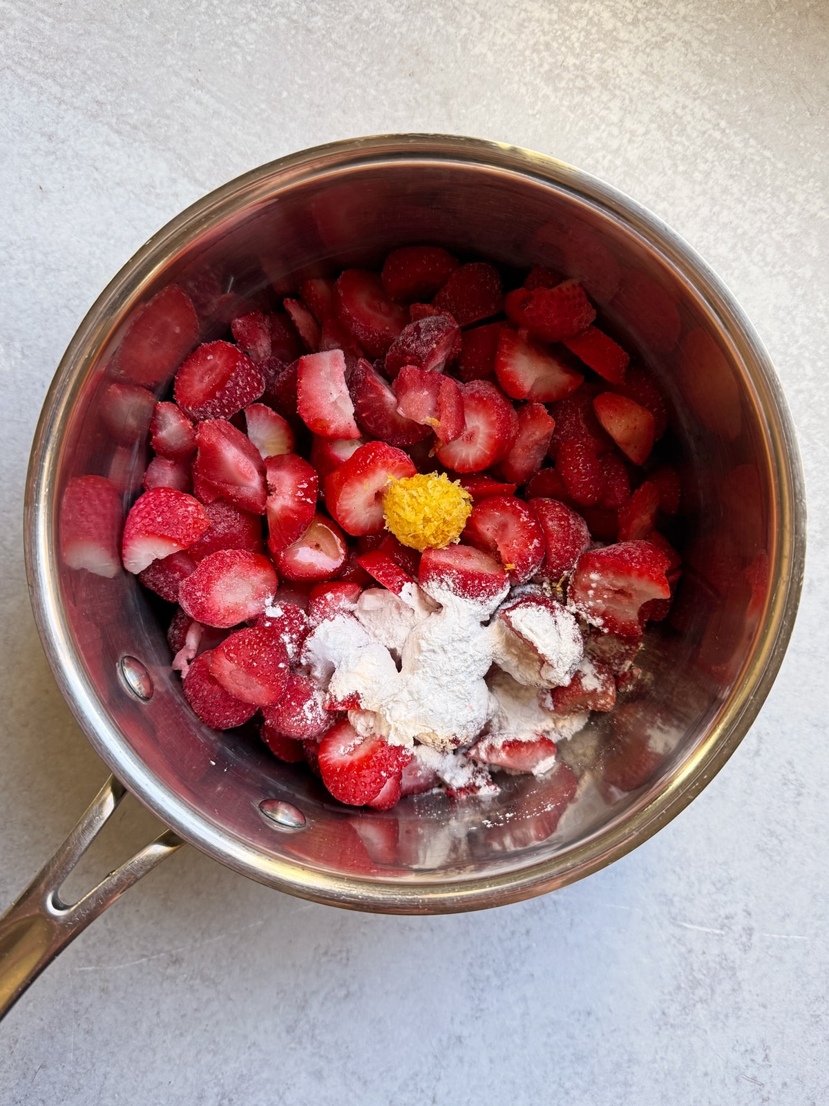 Filling ingredients in saucepan, ready to cook.