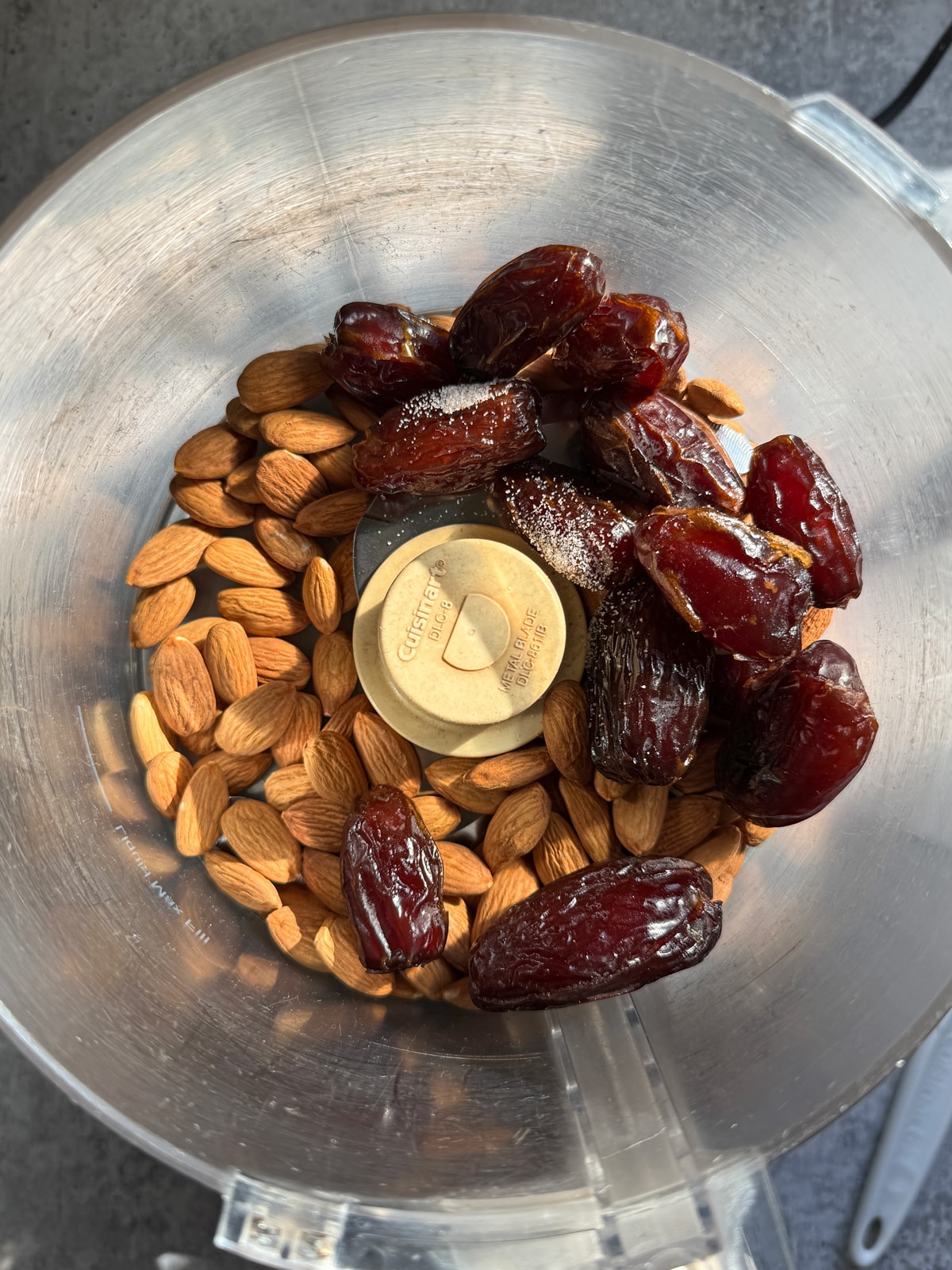 Filling ingredients in food processor.