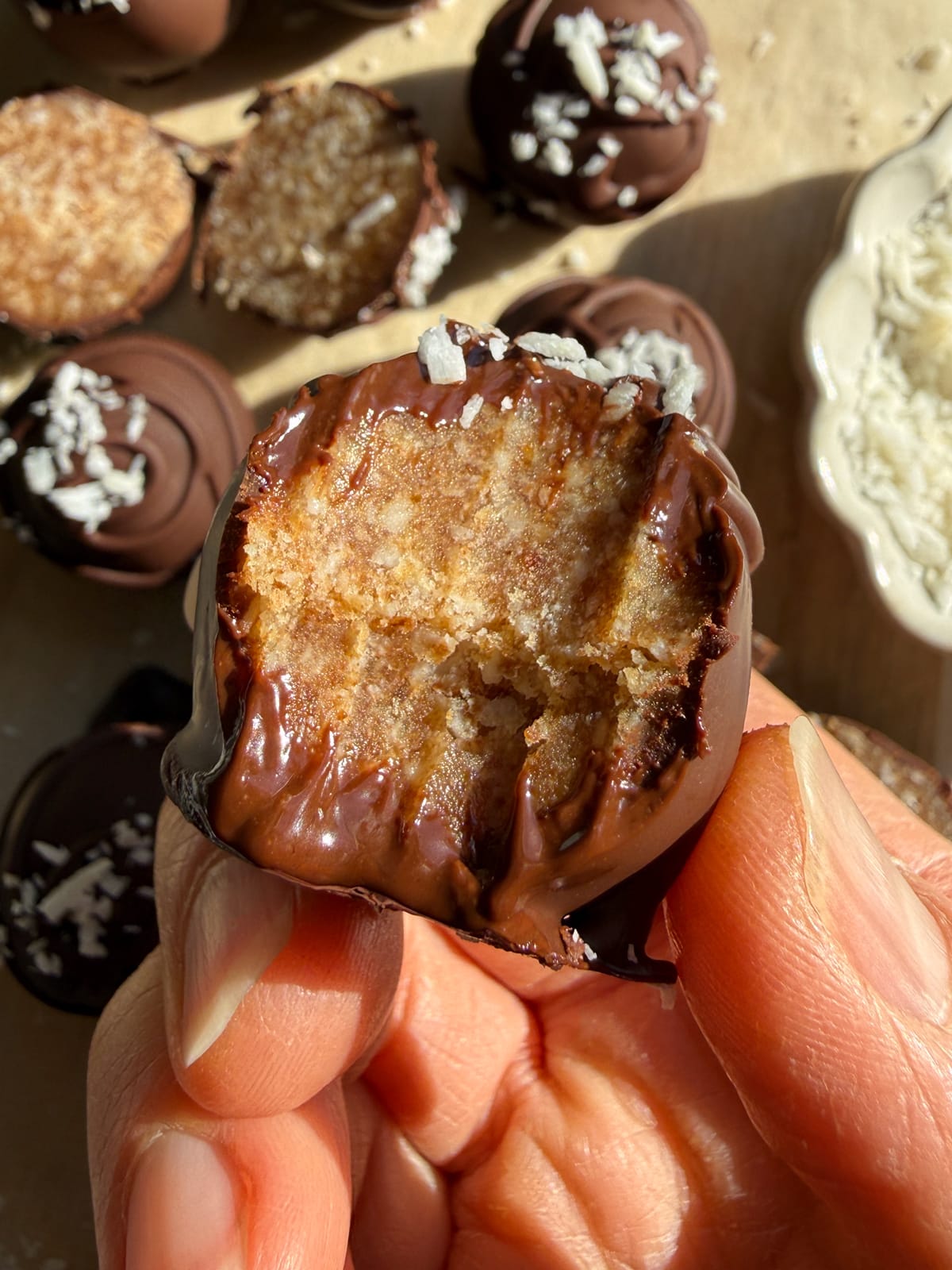 Bite of an energy ball to show the texture.