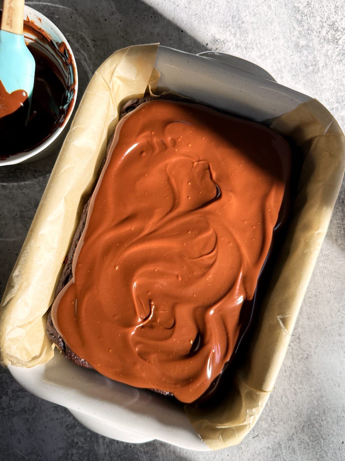 Frosted cake in pan.
