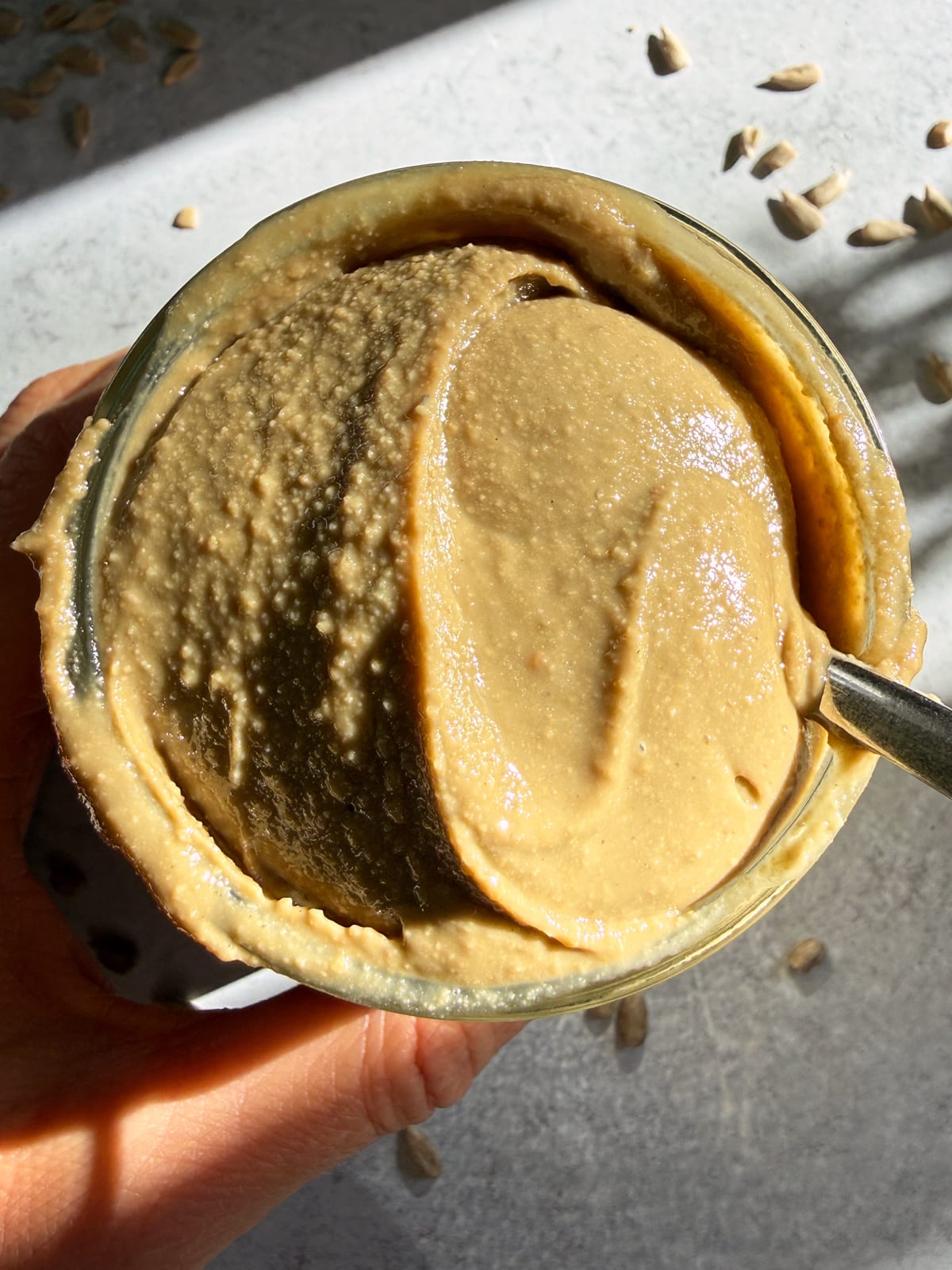 Jar of homemade sunflower seed butter.