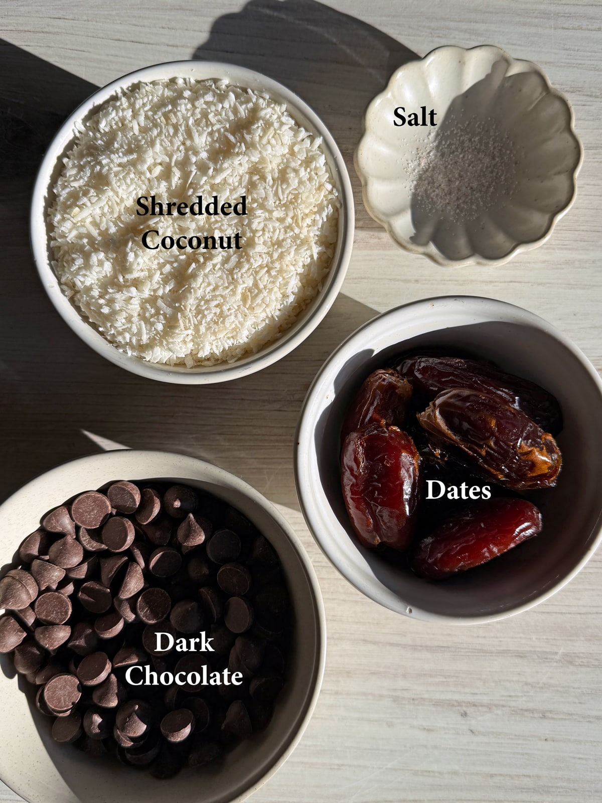 Ingredients needed to make coconut date balls.