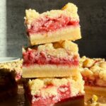 Stack of three strawberry bars.