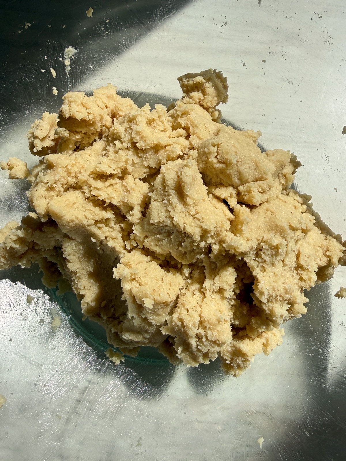 Dough for crust in mixing bowl.
