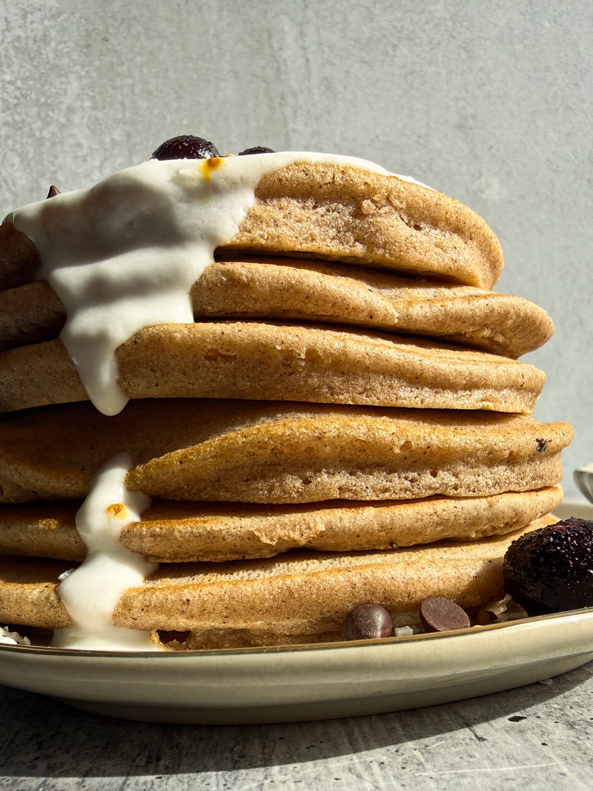 Close up of a stack of cassava pancakes.