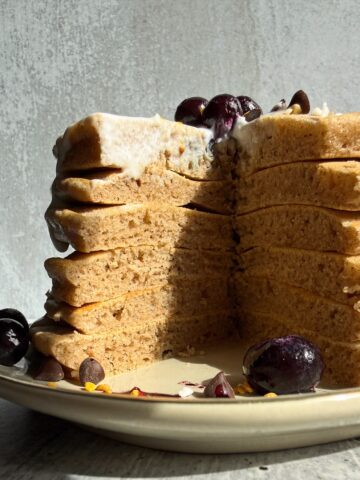 Cut stack of pancakes to show the inside texture.