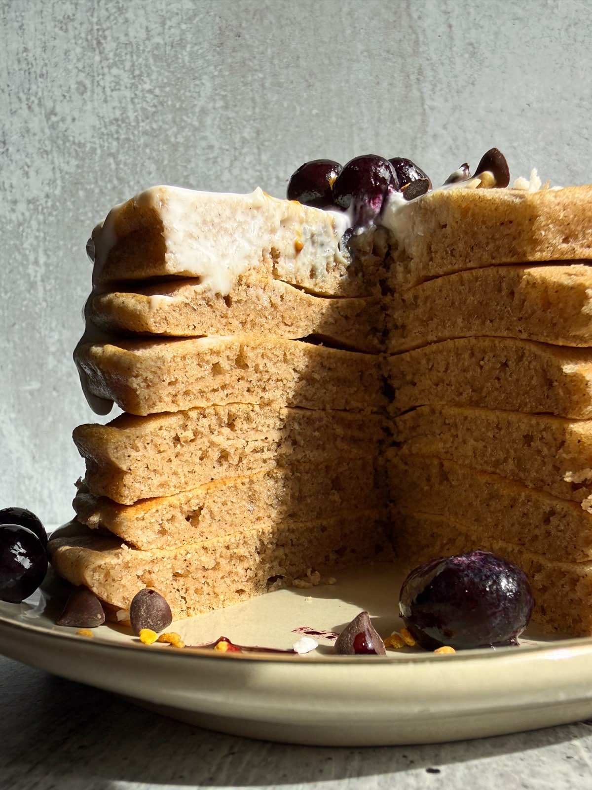 Cut stack of pancakes to show the inside texture.