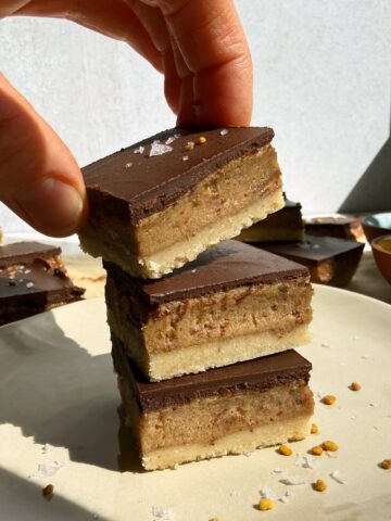 Grabbing a millionaire bar from a stack of 3.