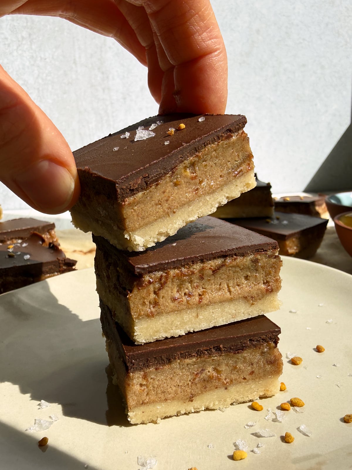 Grabbing a millionaire bar from a stack of 3.