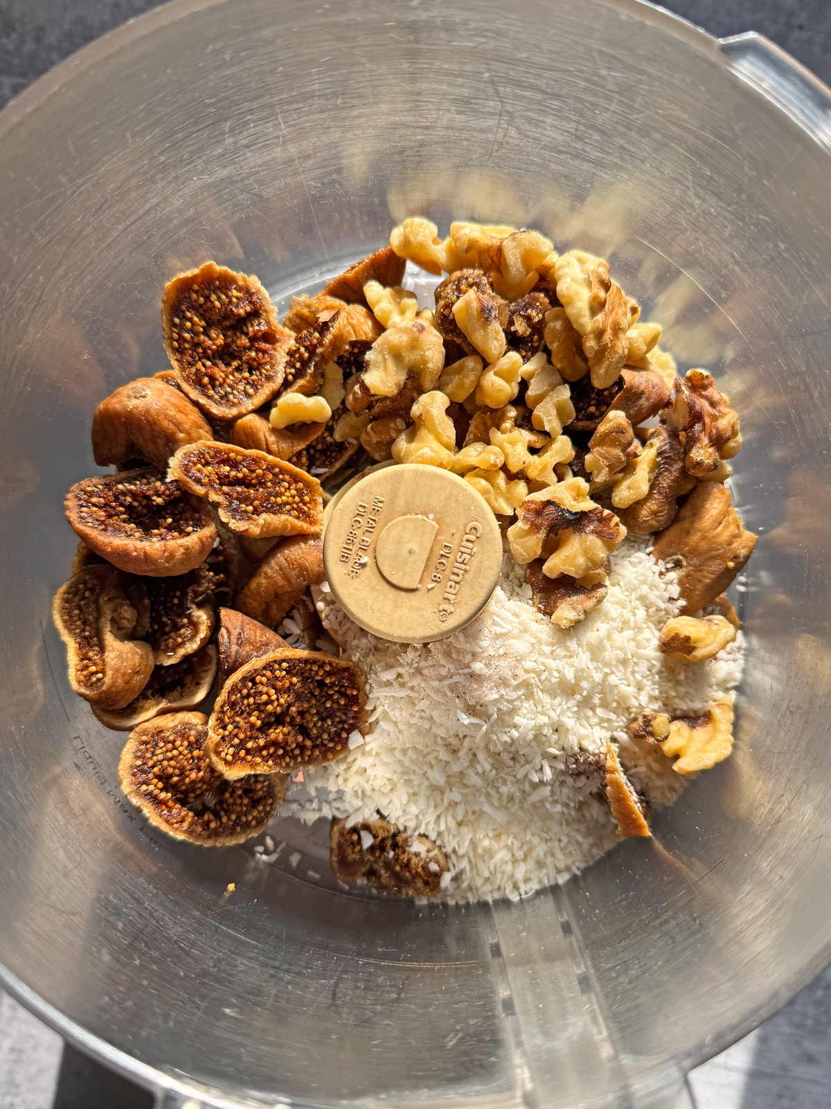 Filling ingredients in food processor.