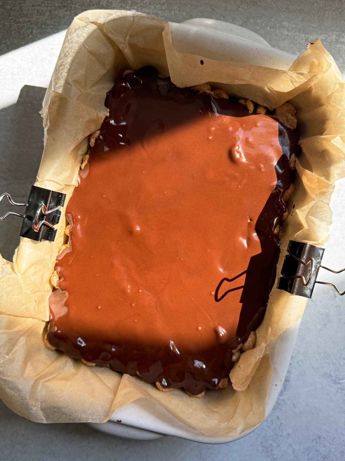 Bars topped with chocolate.