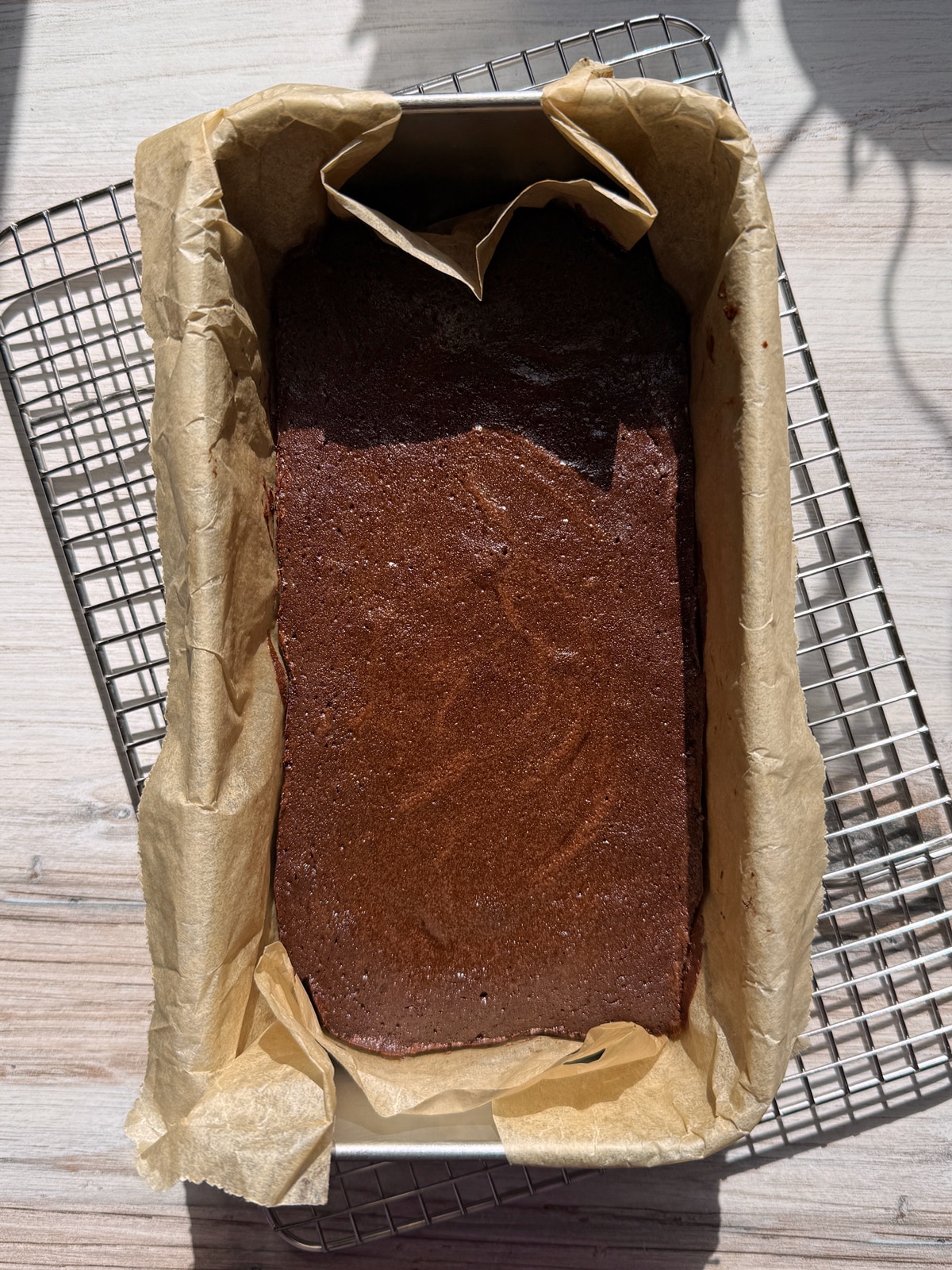 Baked brownies in loaf pan.