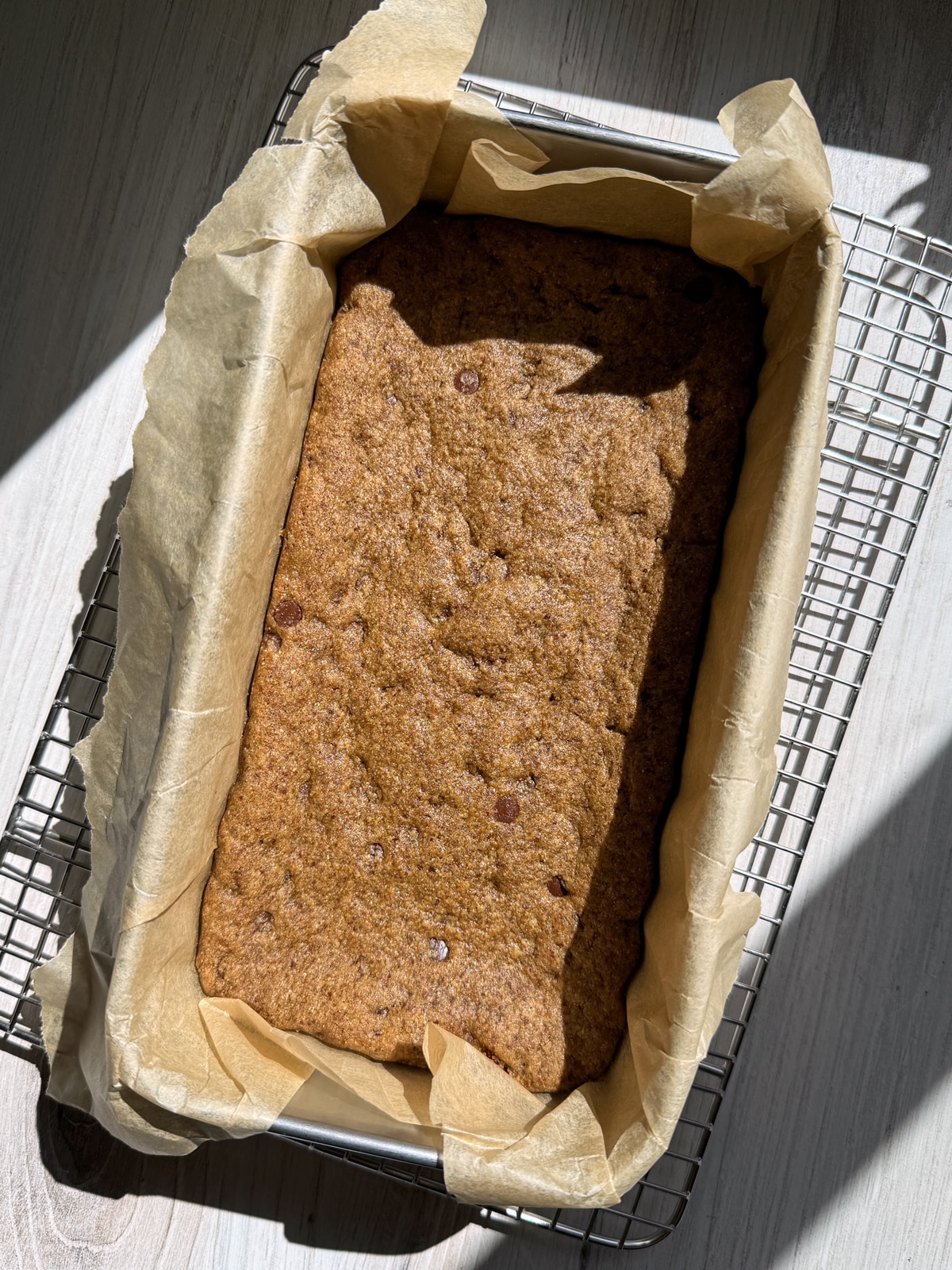 Freshly baked bars in loaf pan.