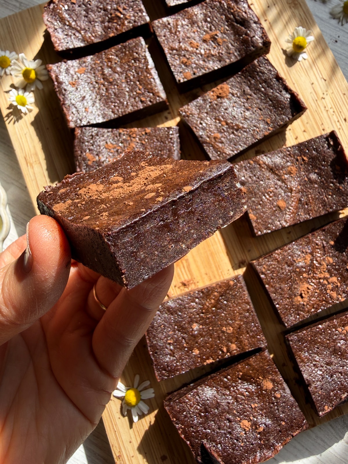 Holding a brownie.