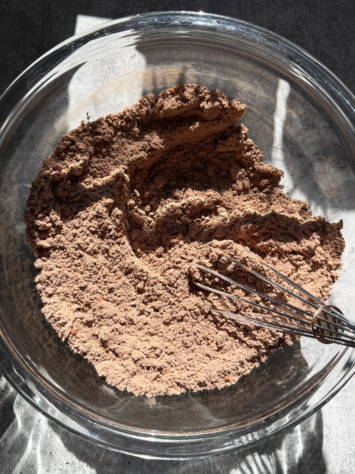 Combined dry cookie cup ingredients in mixing bowl.
