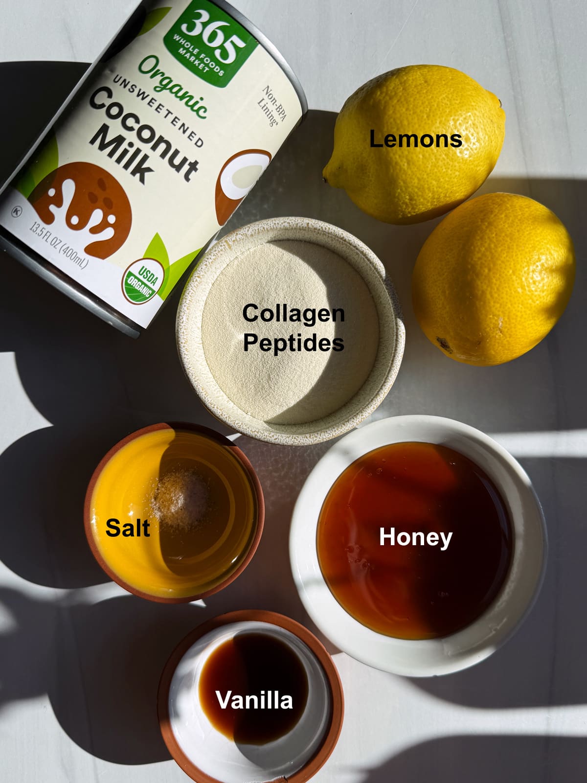 Ingredients needed to make paleo lemon ice cream bars.