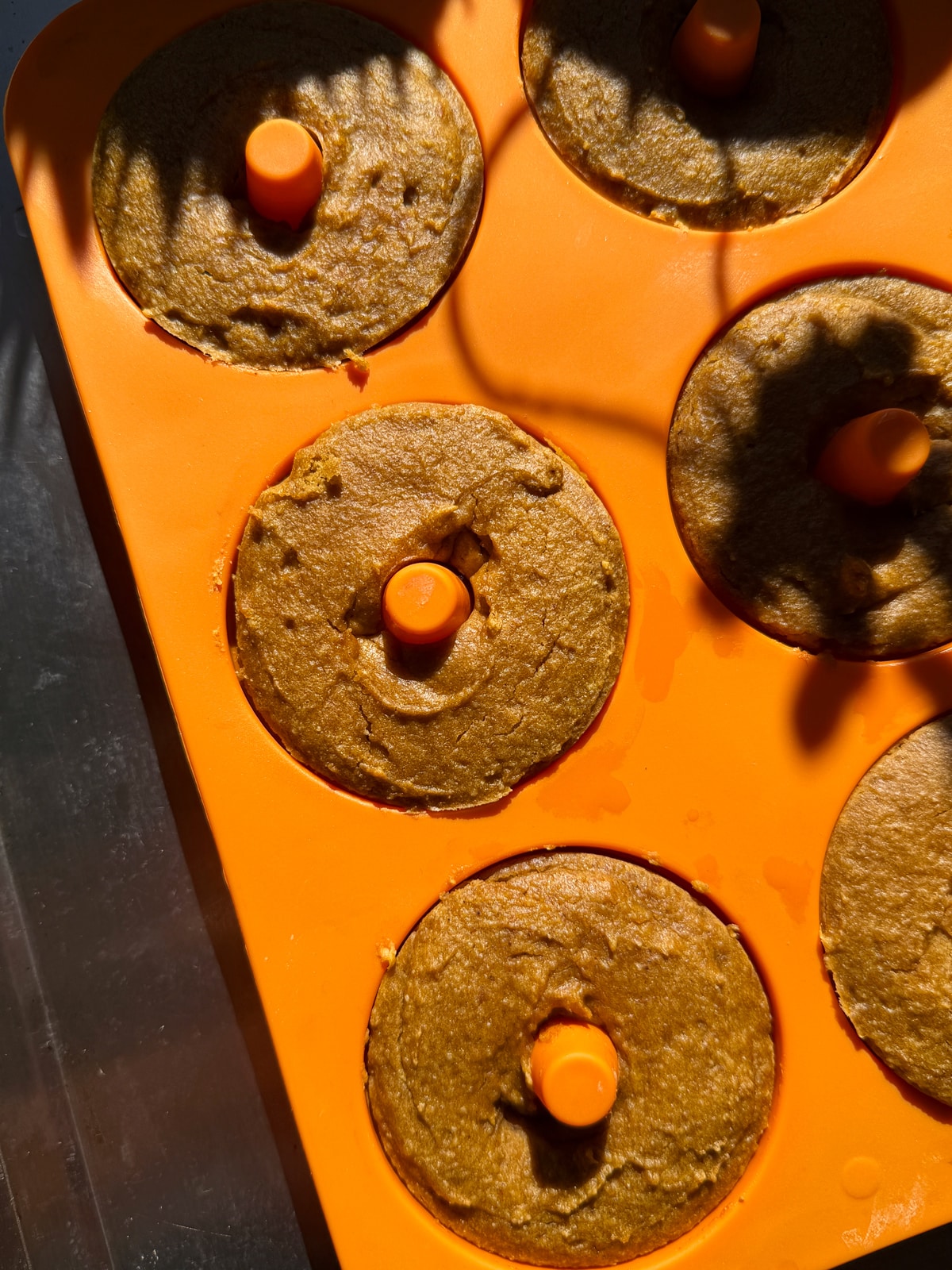 Baked donuts in donut pan.