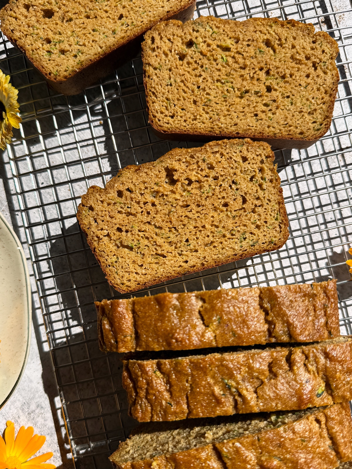 Slices of bread on wire cooling rack.