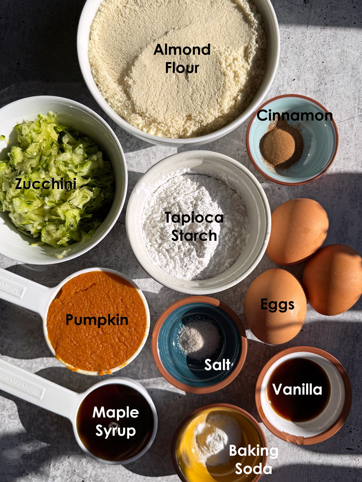 Ingredients needed to make paleo pumpkin zucchini bread.