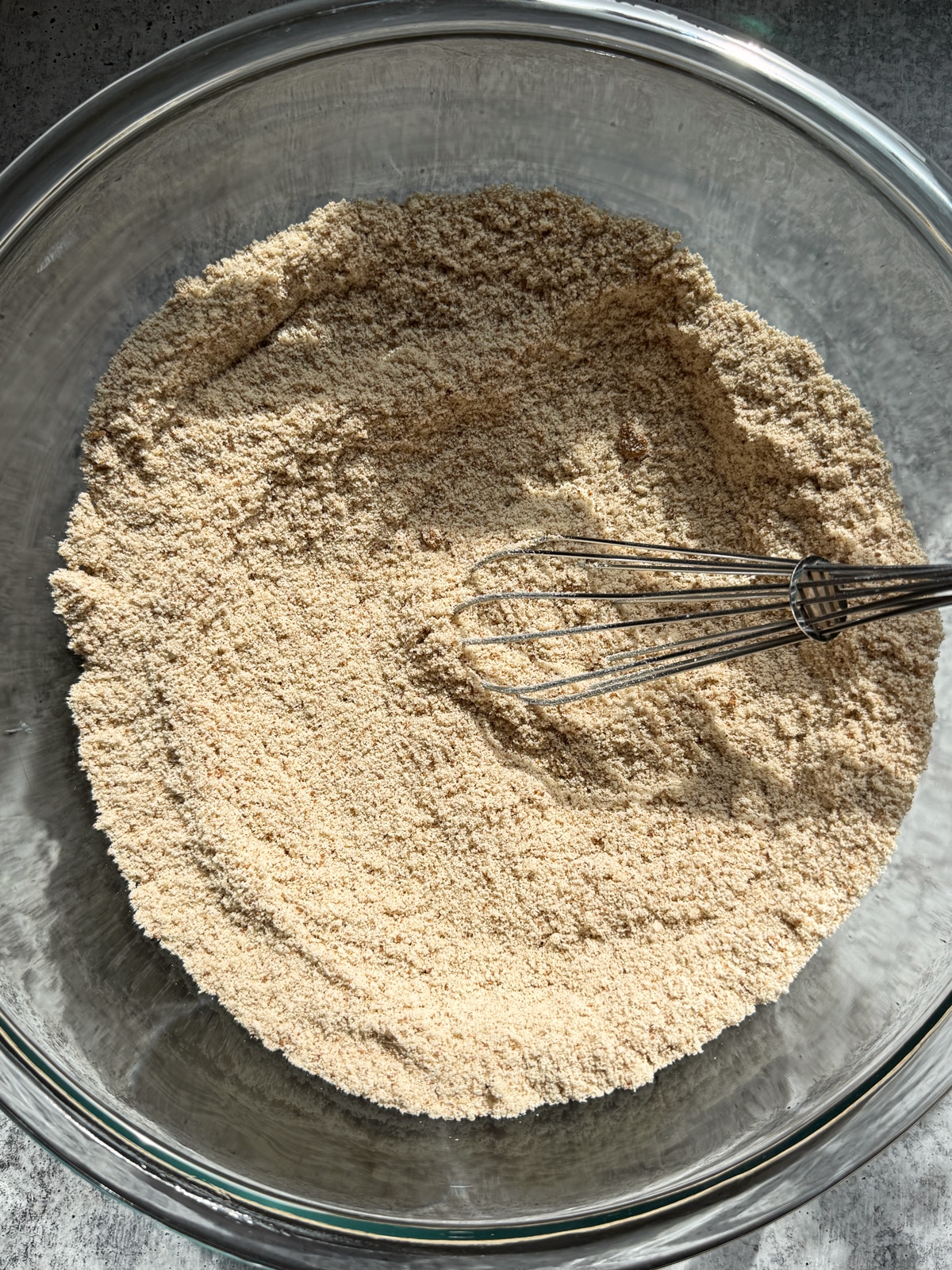 Combined dry ingredients in mixing bowl.