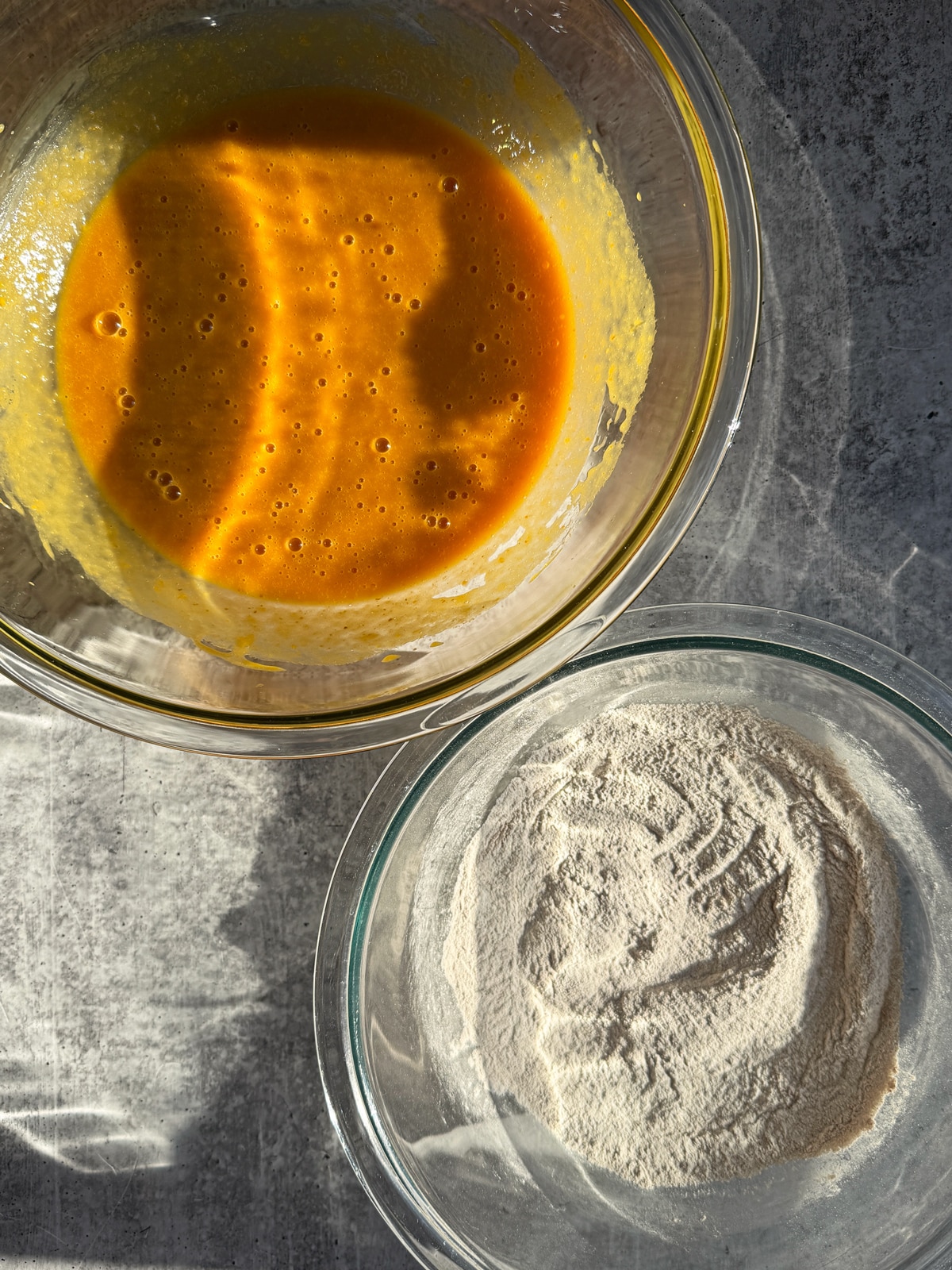 The wet ingredients in one bowl and the dry in another.