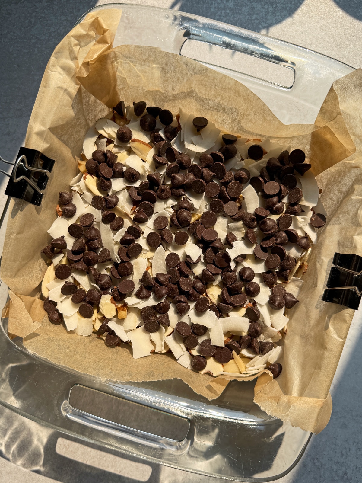 Assembled bars, ready to be topped with the homemade caramel.