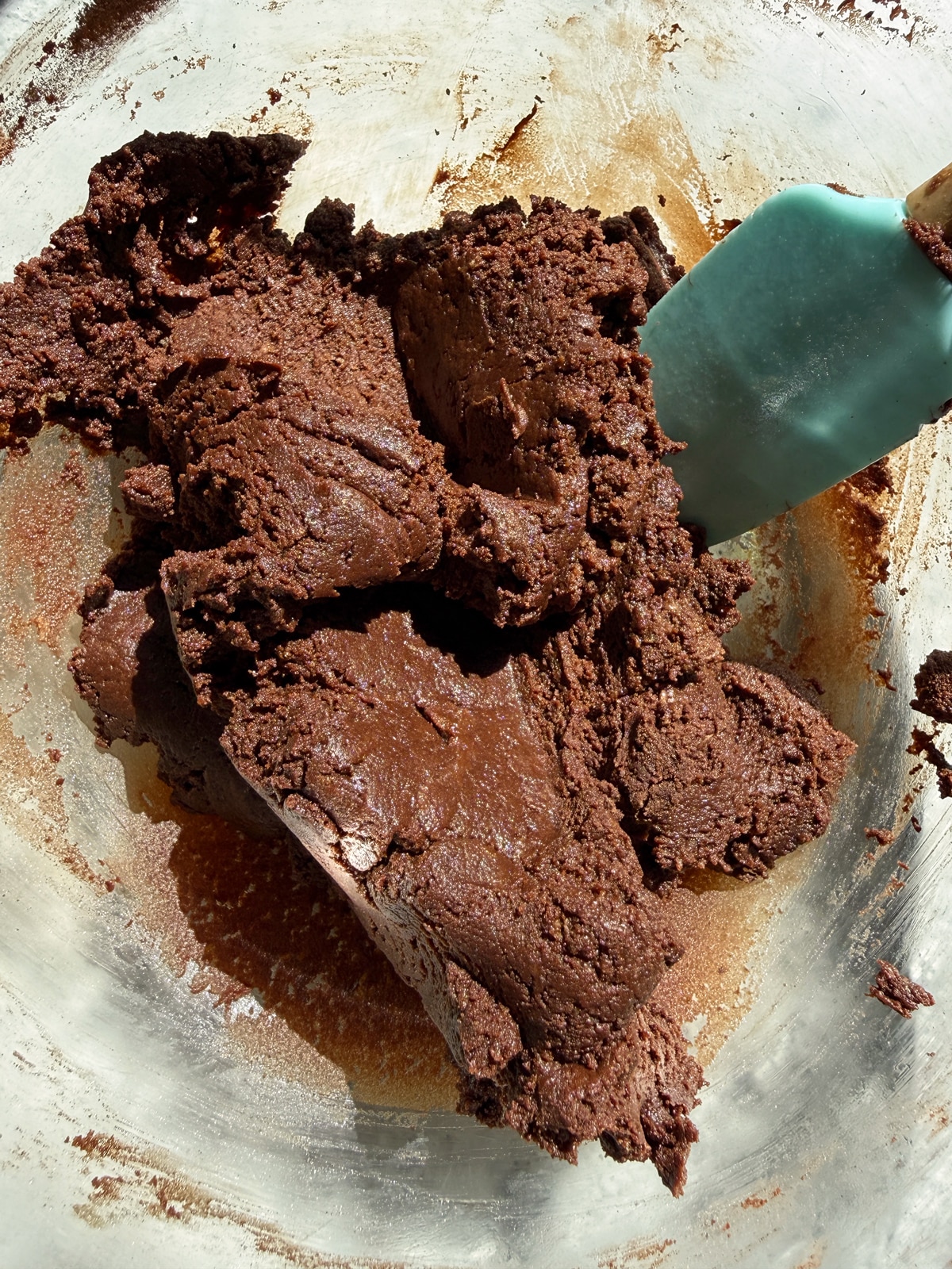 Dough for chocolate protein bars in mixing bowl.