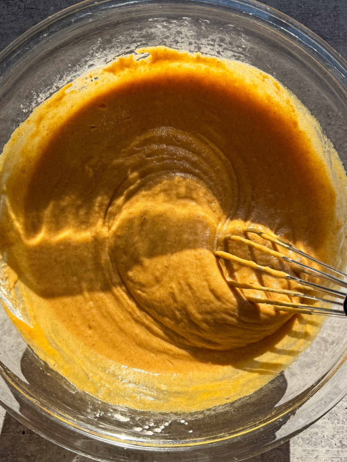 Mixing the batter in a mixing bowl.