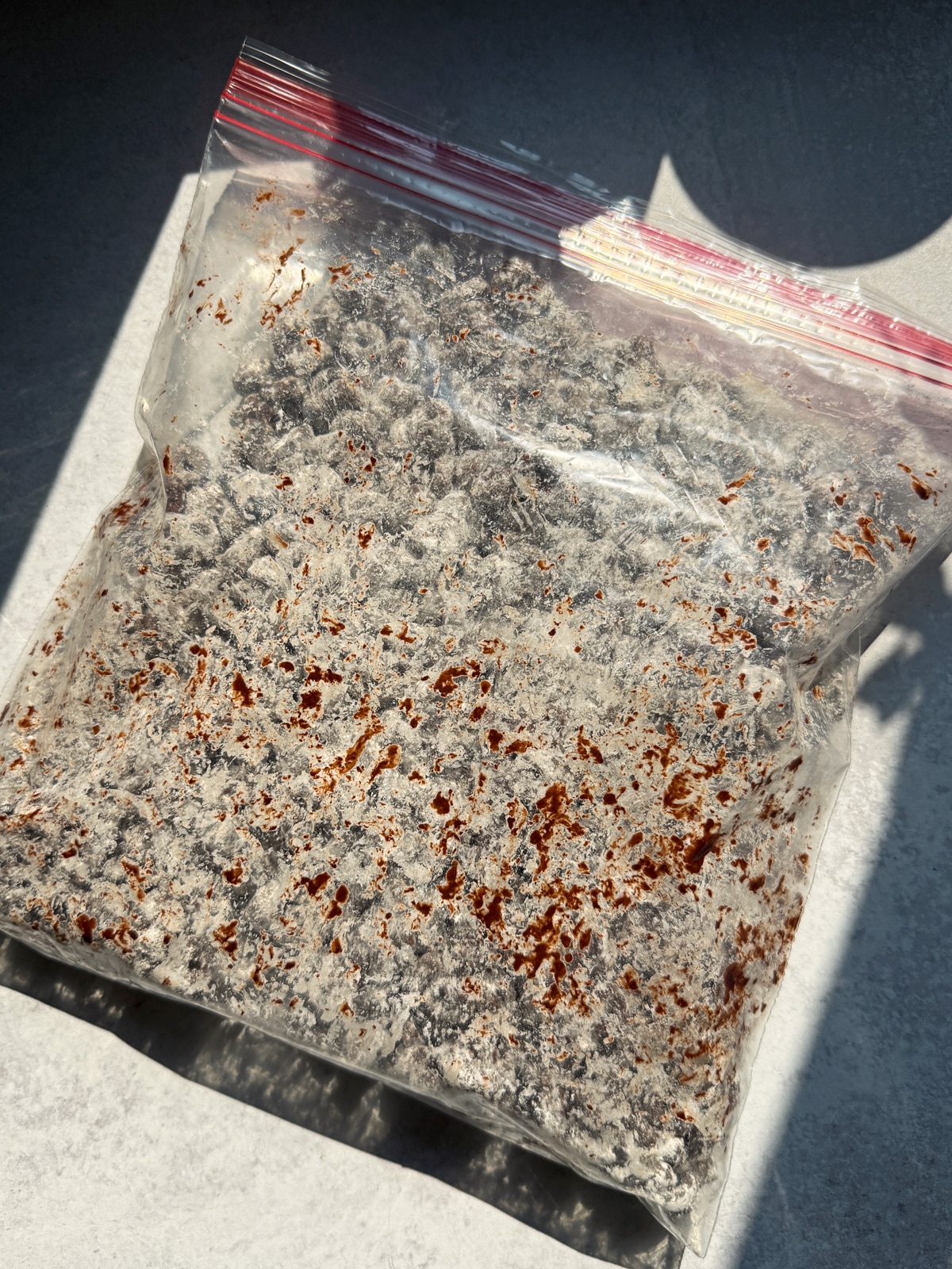 Puppy chow in a bag, tossed in powdered sugar.