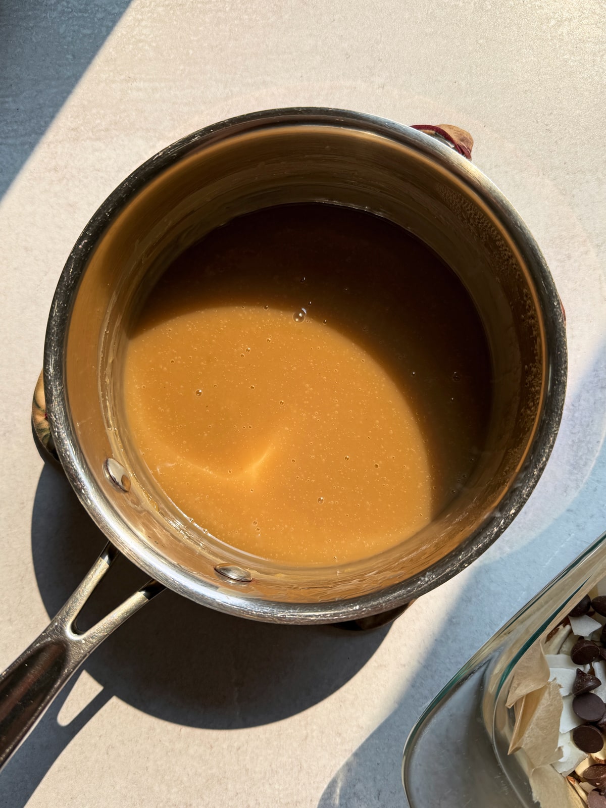 Cooked caramel in saucepan.