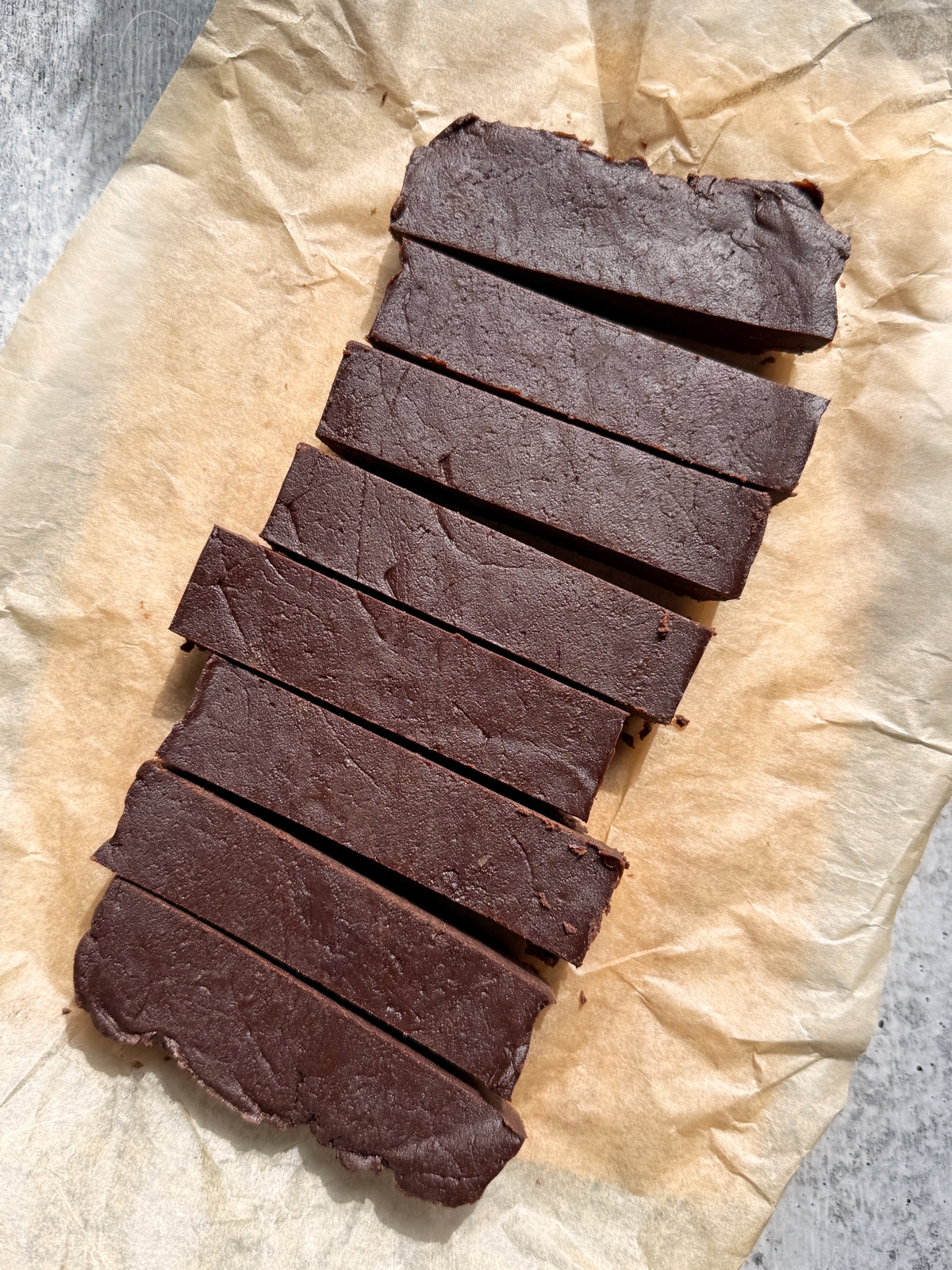 Cut bars on parchment paper.